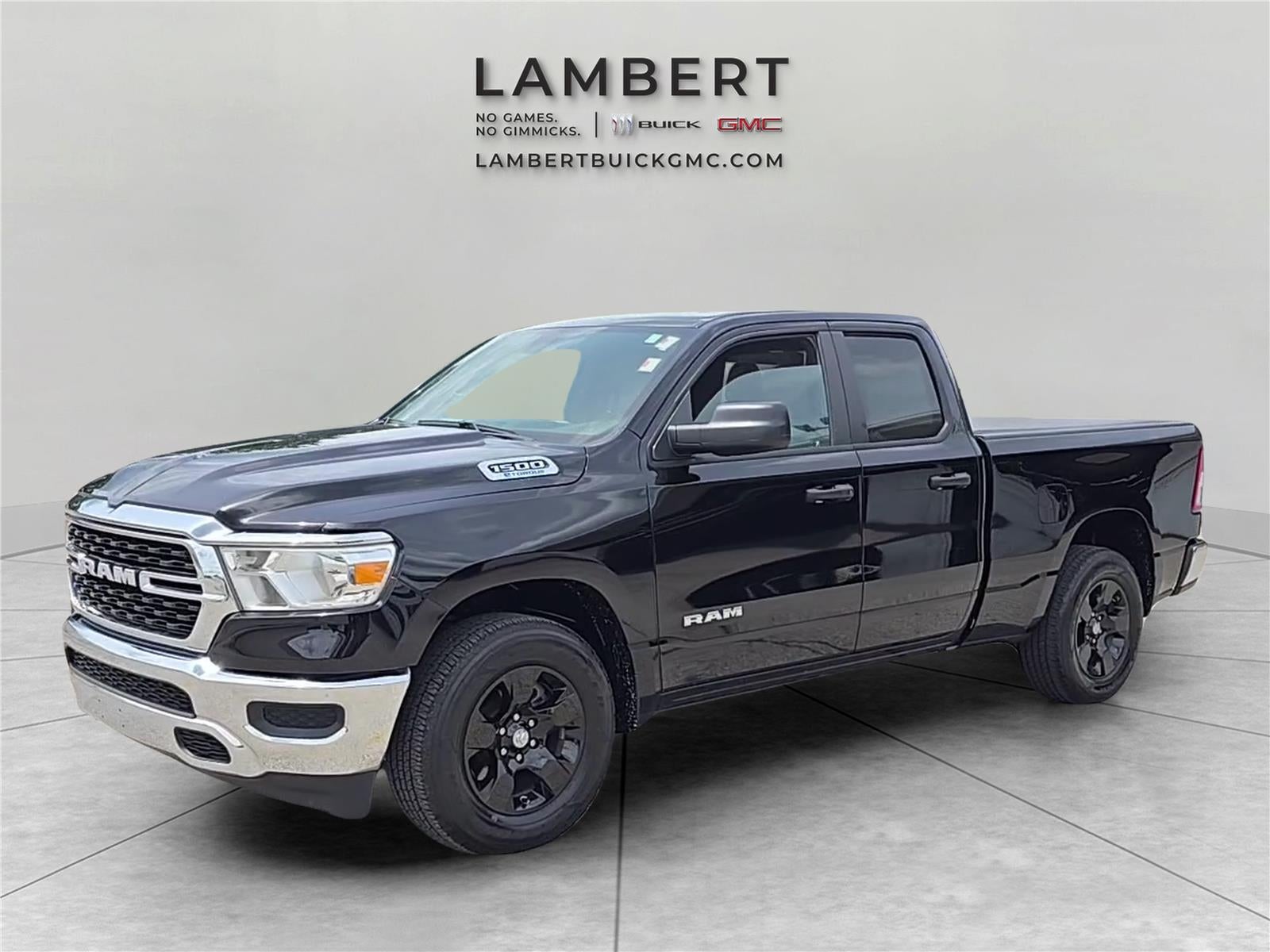 2023 RAM 1500 Big Horn in Diamond Black C — front three-quarter view