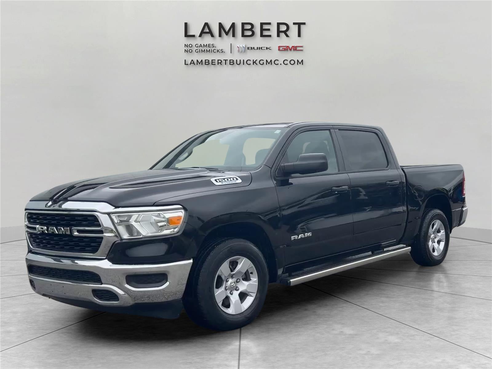2023 RAM 1500 Big Horn in Diamond Black C — front three-quarter view
