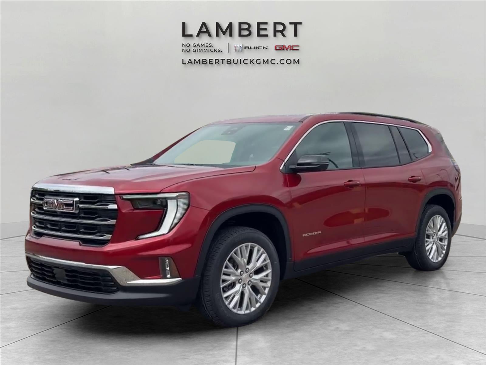 2026 GMC Acadia Elevation in Volcanic Red Tintcoat — front three-quarter view