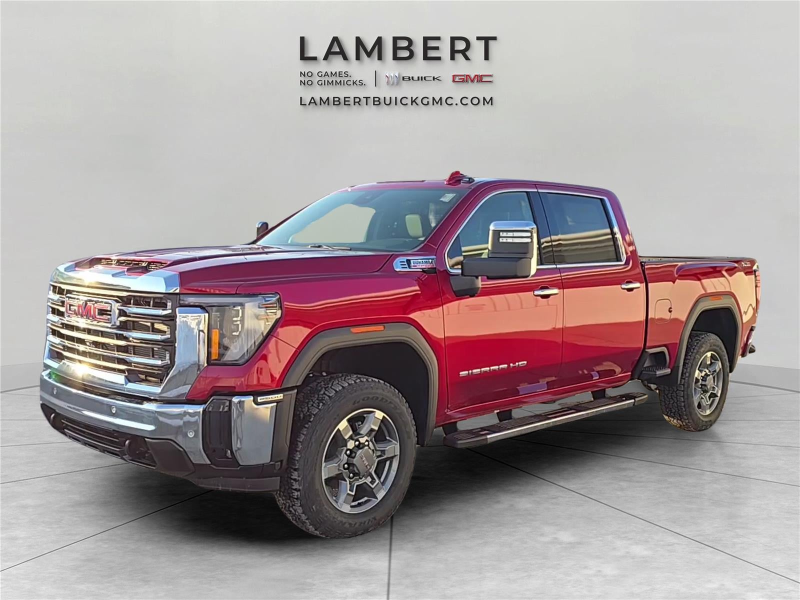 2026 GMC Sierra 2500 HD SLT in Volcanic Red Tintcoat — front three-quarter view