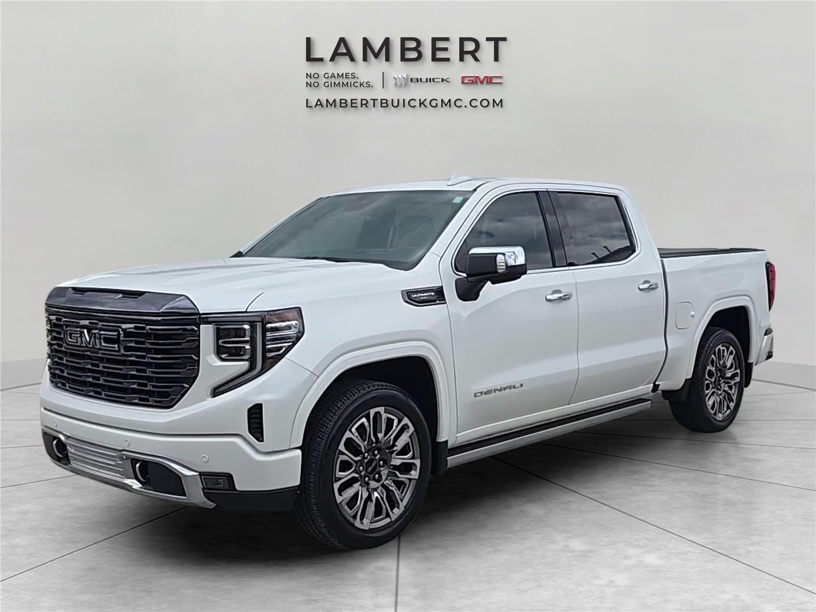 2024 GMC Sierra 1500 Denali Ultimate in White Frost Tricoat — front three-quarter view