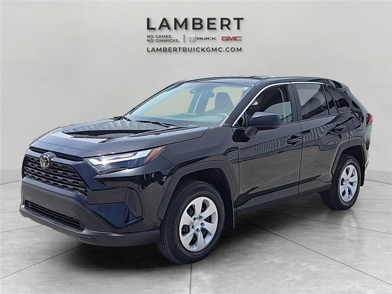 2024 Toyota RAV4 LE in Black — front three-quarter view