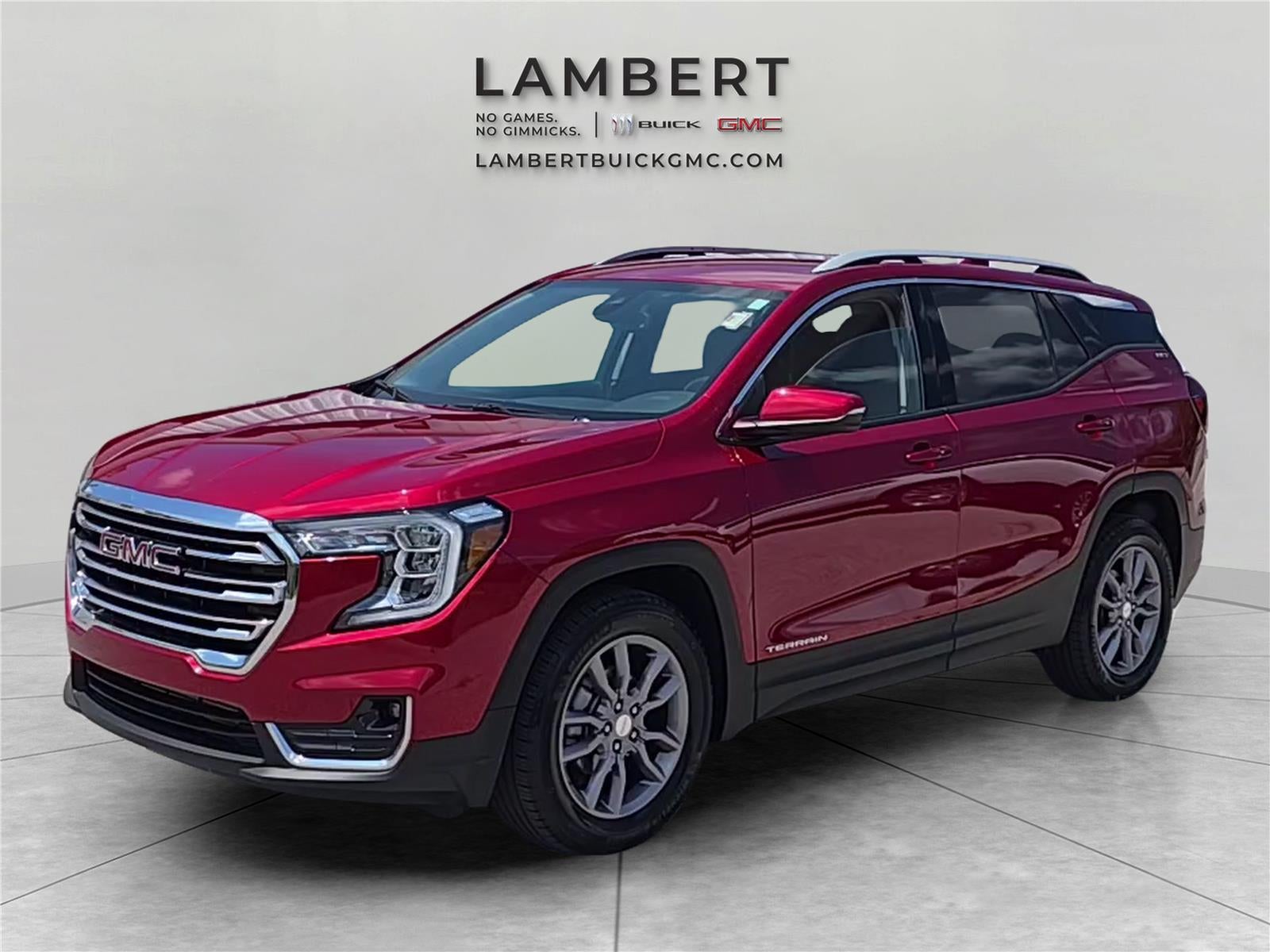 2023 GMC Terrain SLT in Volcanic Red Tintcoat — front three-quarter view
