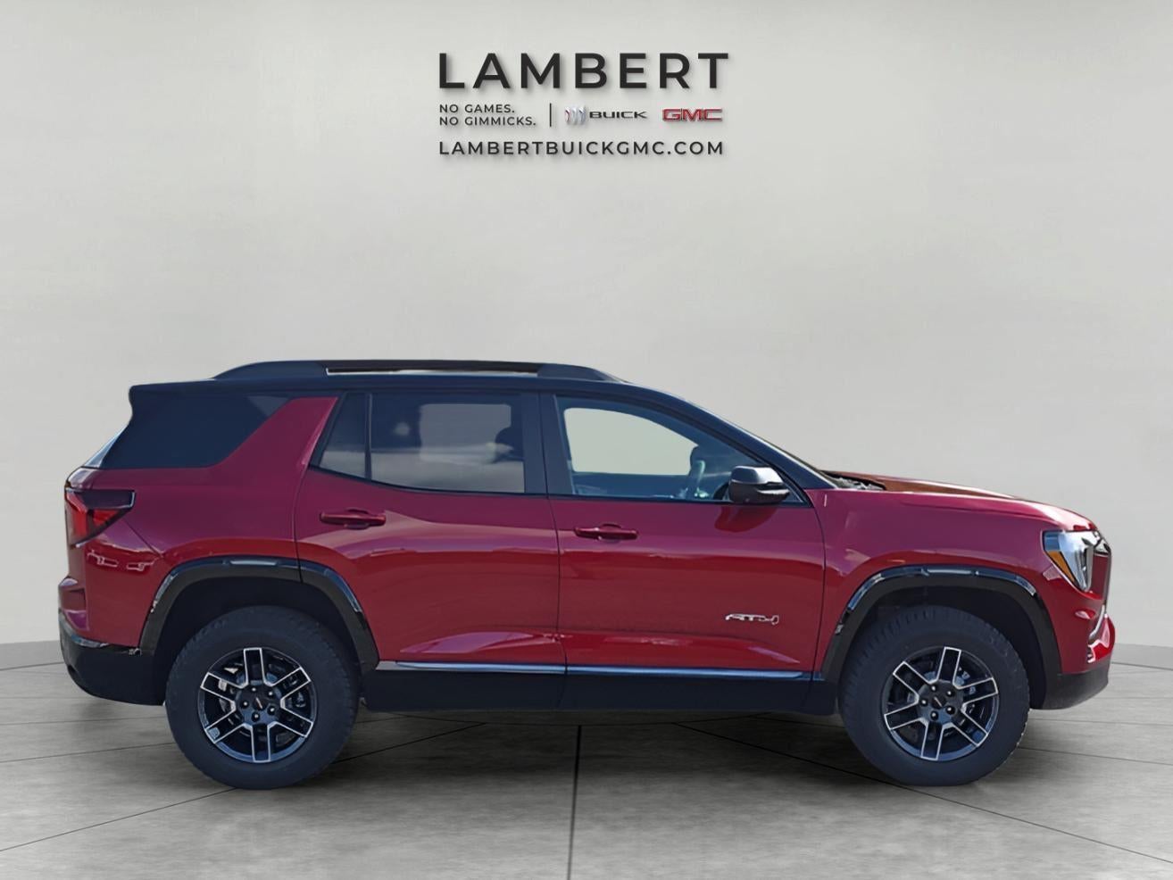 2026 GMC Terrain AT4 in Volcanic Red Tintcoat — front three-quarter view