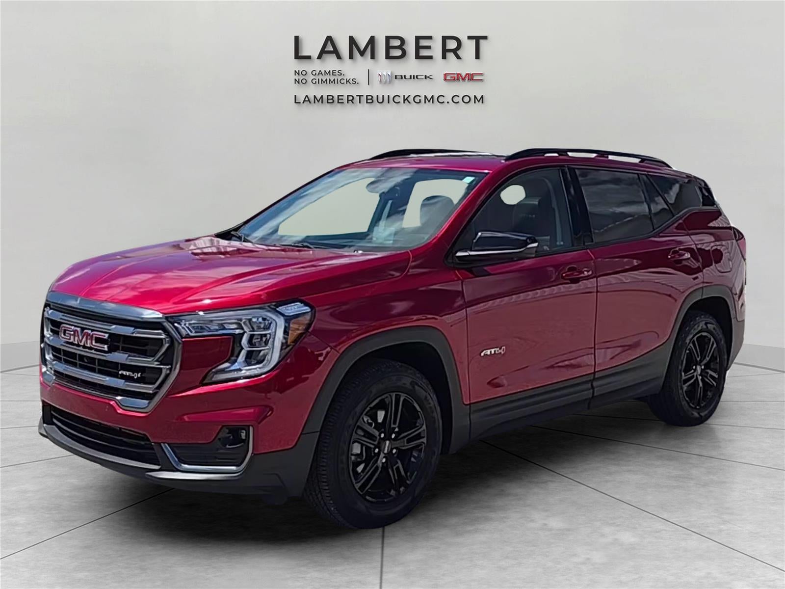 2023 GMC Terrain AT4 in Volcanic Red Tintcoat — front three-quarter view