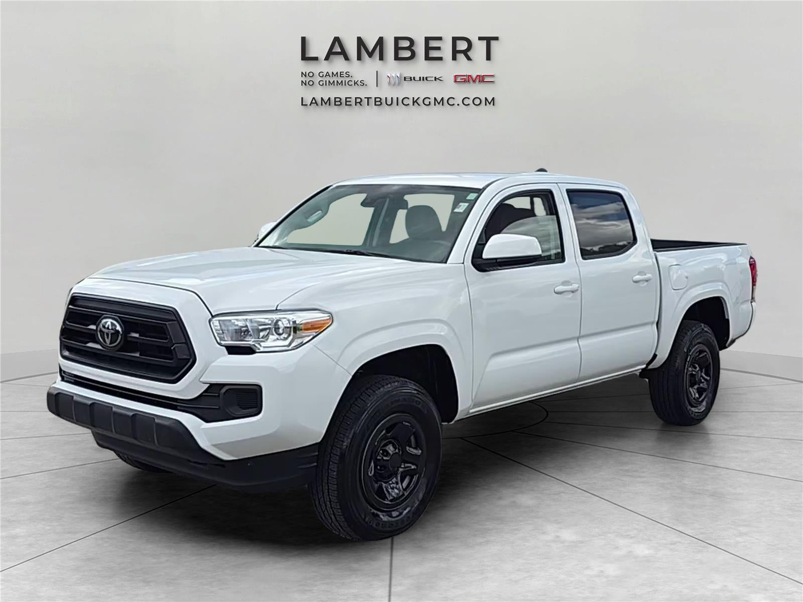 2023 Toyota Tacoma 4WD SR in Ice Cap — front three-quarter view