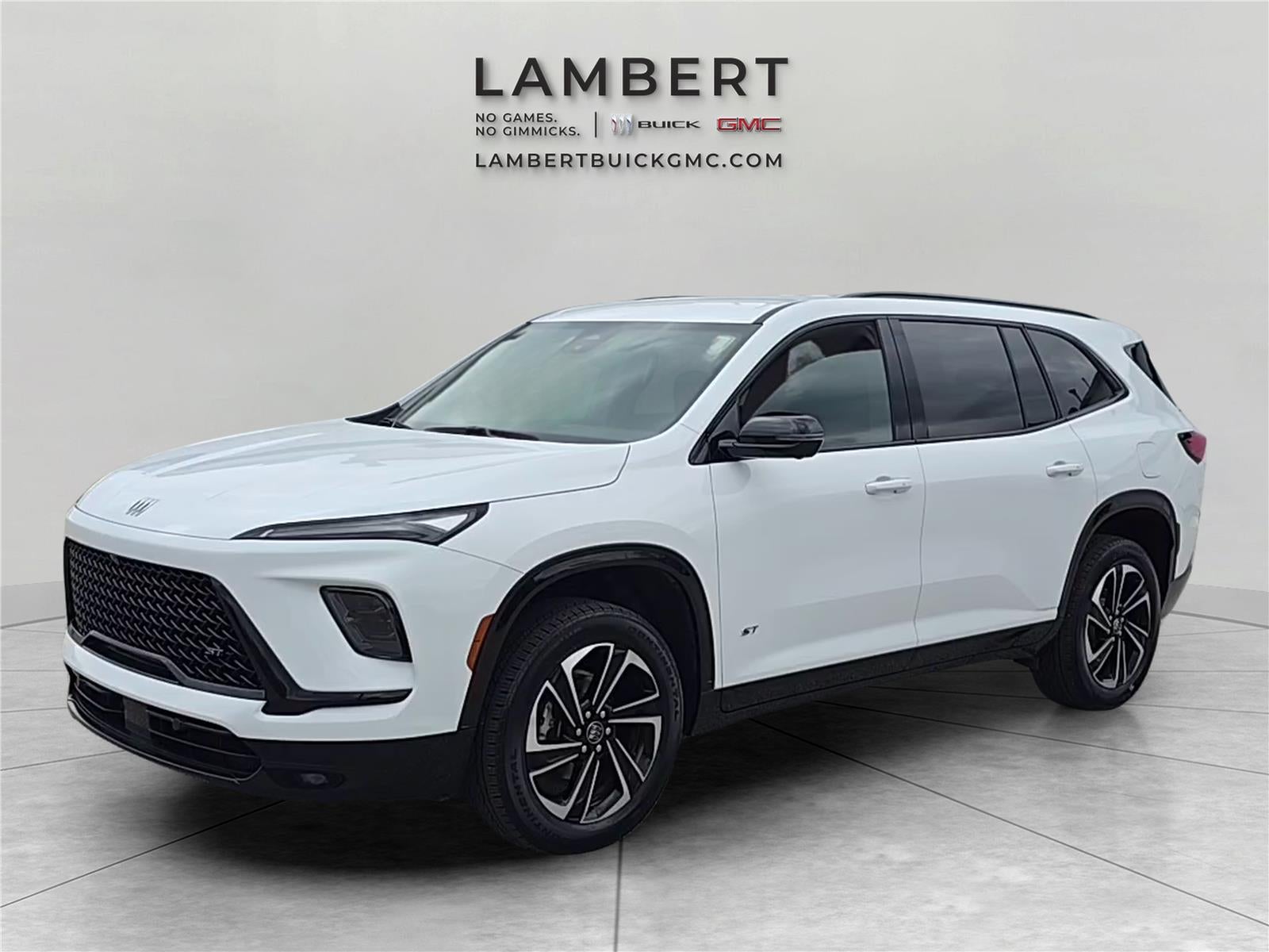 2025 Buick Enclave Sport Touring in Summit White — front three-quarter view