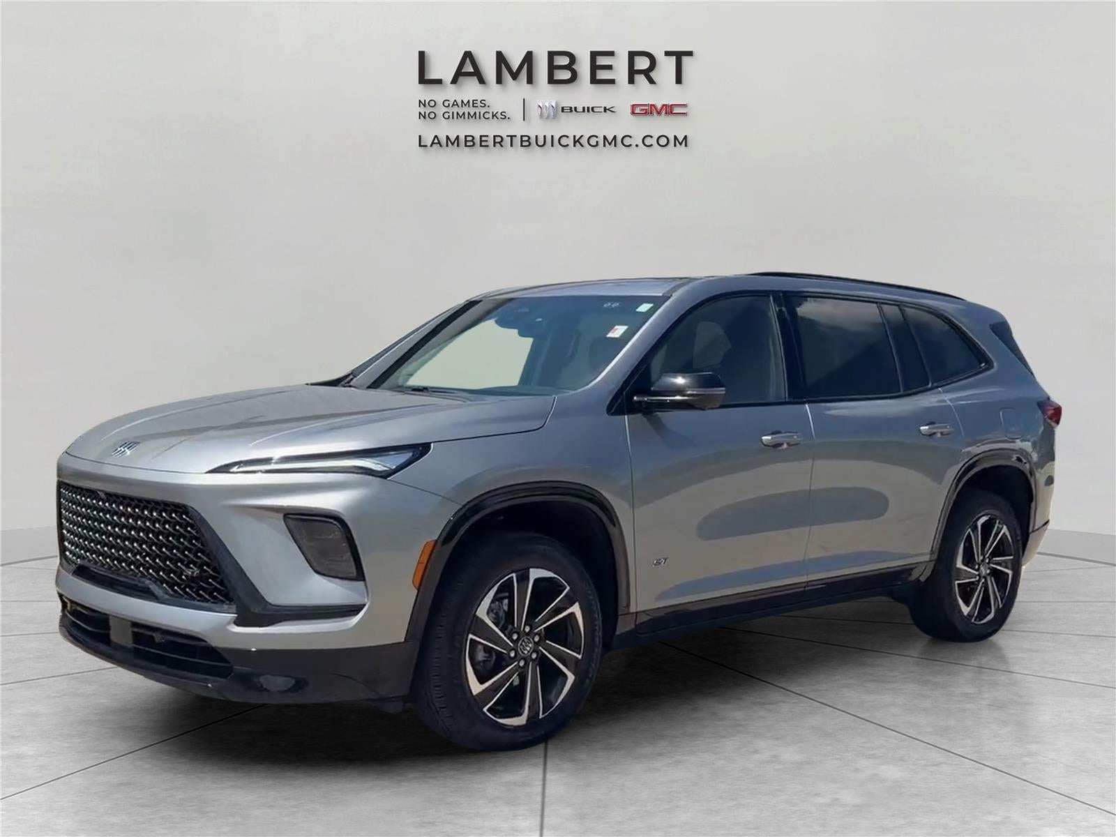 2026 Buick Enclave Sport Touring in Moonstone Gray Metallic — front three-quarter view