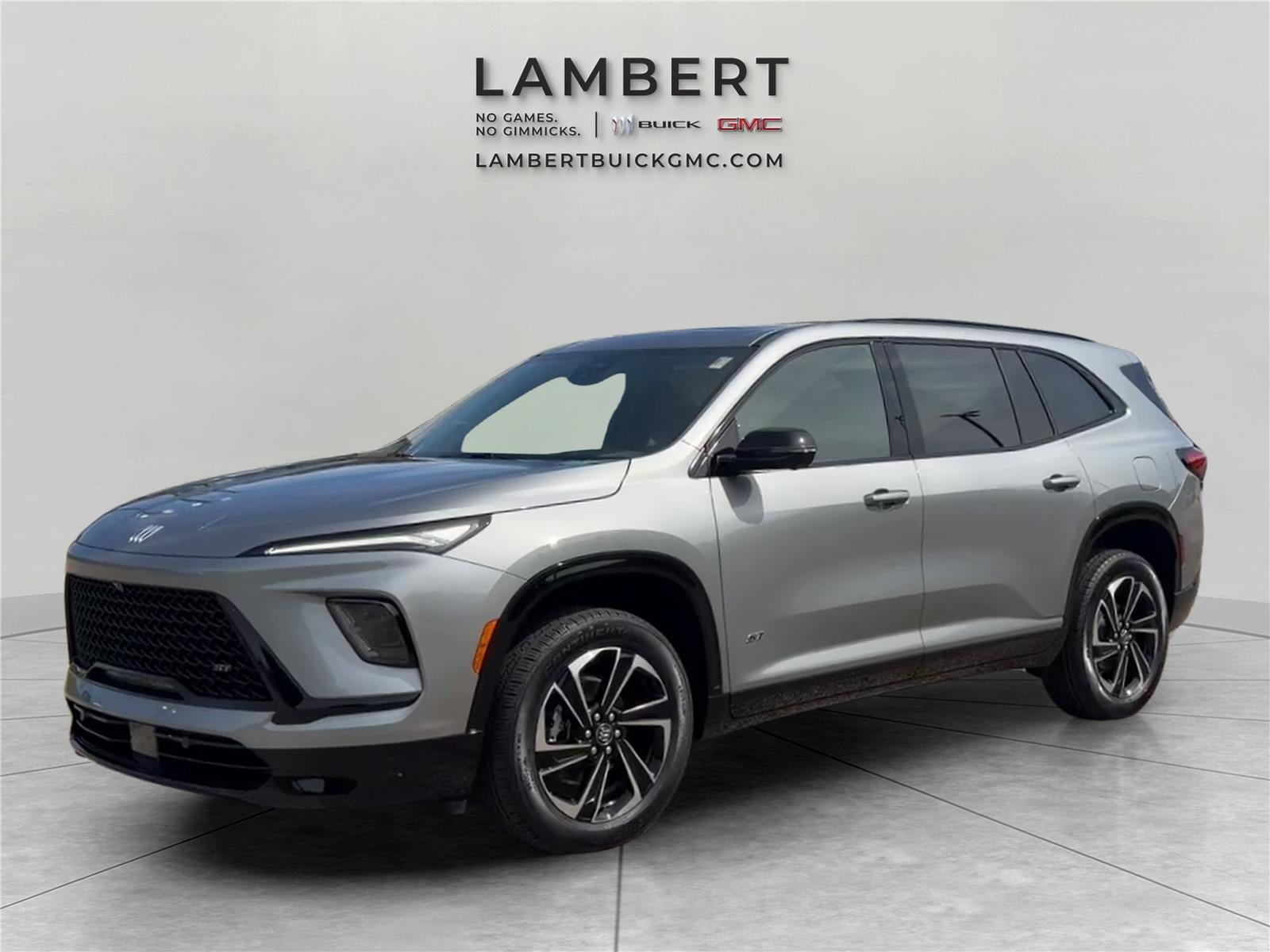 2026 Buick Enclave Sport Touring in Moonstone Gray Metallic — front three-quarter view