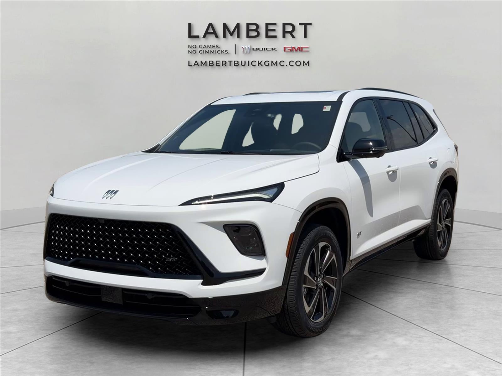 2026 Buick Enclave Sport Touring in Summit White — front three-quarter view