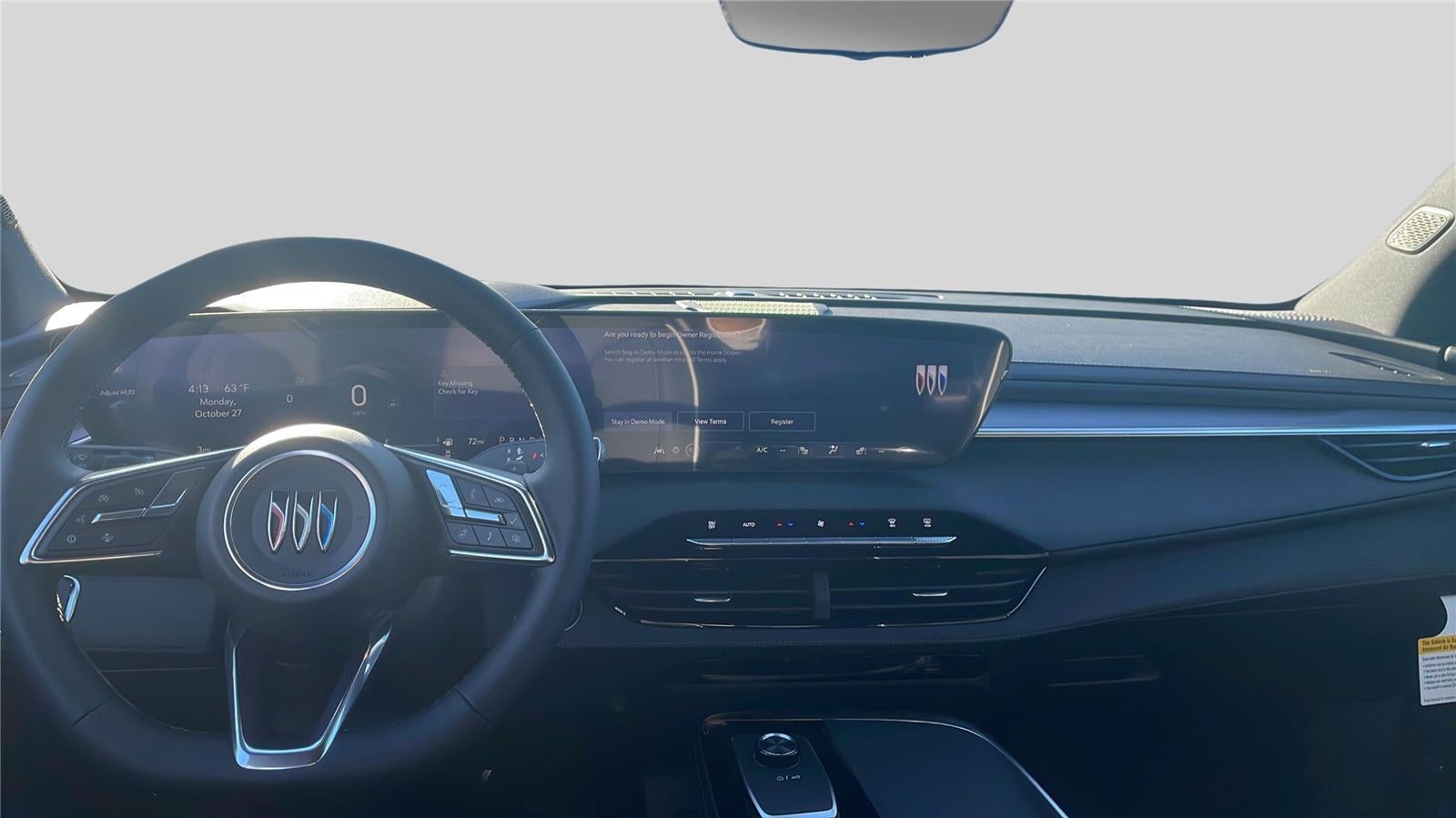 2026 Buick Enclave Sport Touring in Moonstone Gray Metallic — front three-quarter view