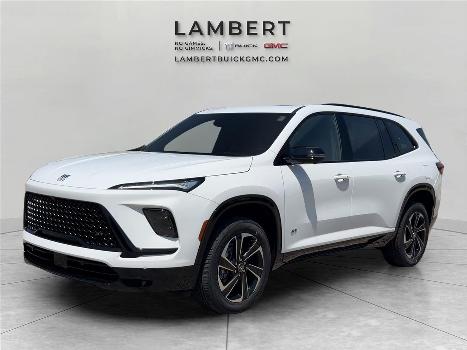 2026 Buick Enclave Sport Touring in Summit White — front three-quarter view