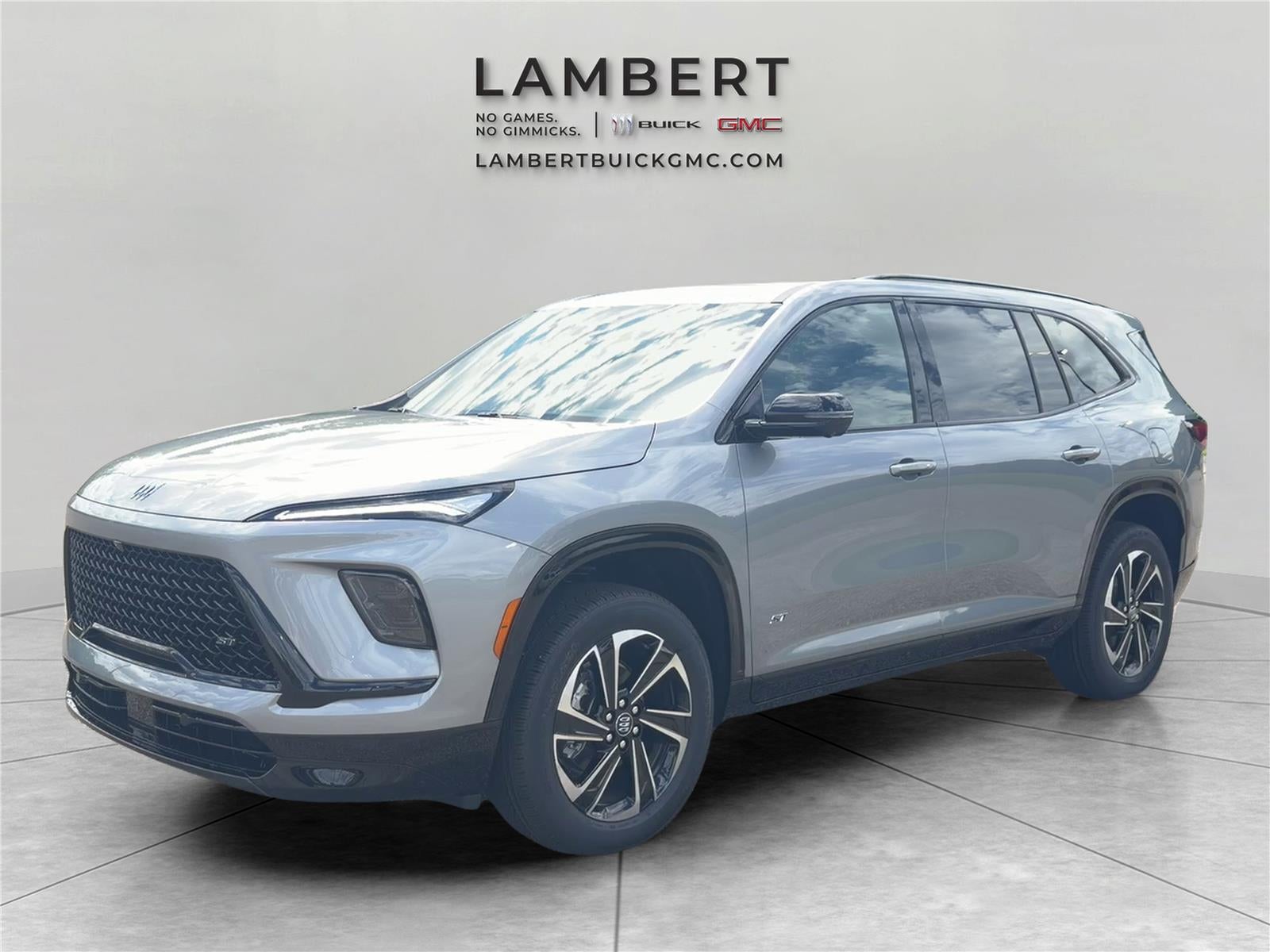 2026 Buick Enclave Sport Touring in Moonstone Gray Metallic — front three-quarter view