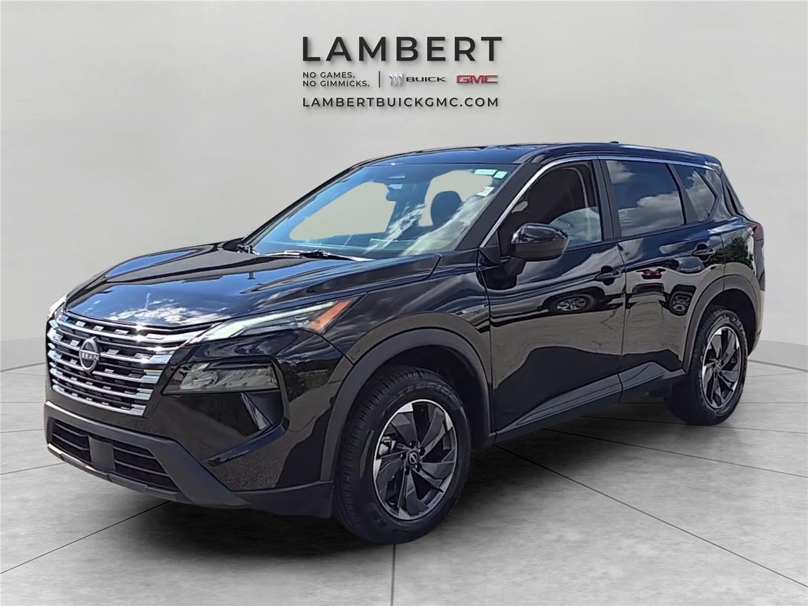 2025 Nissan Rogue SV in Super Black — front three-quarter view