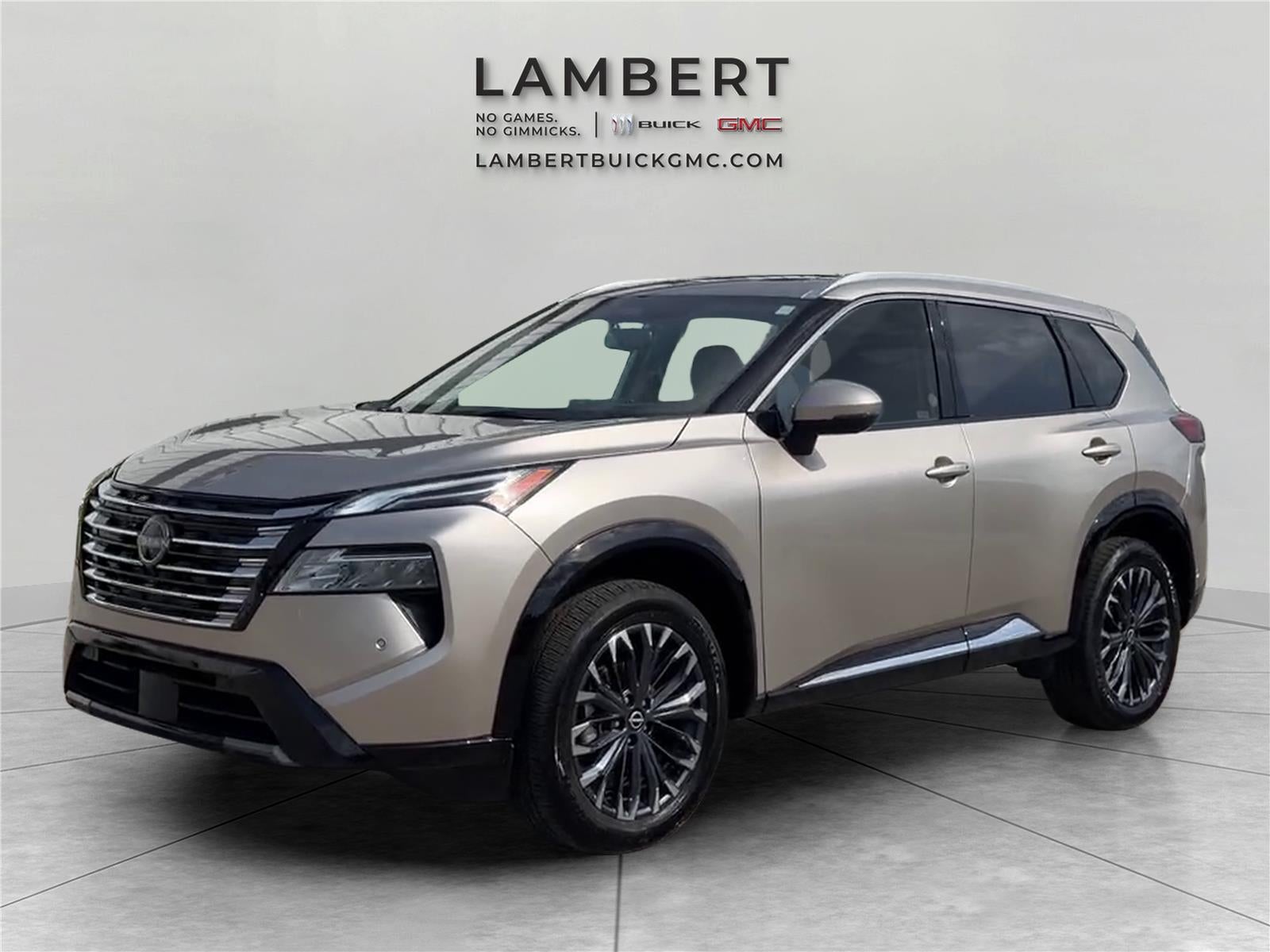 2026 Nissan Rogue Platinum in Champagne Silve — front three-quarter view