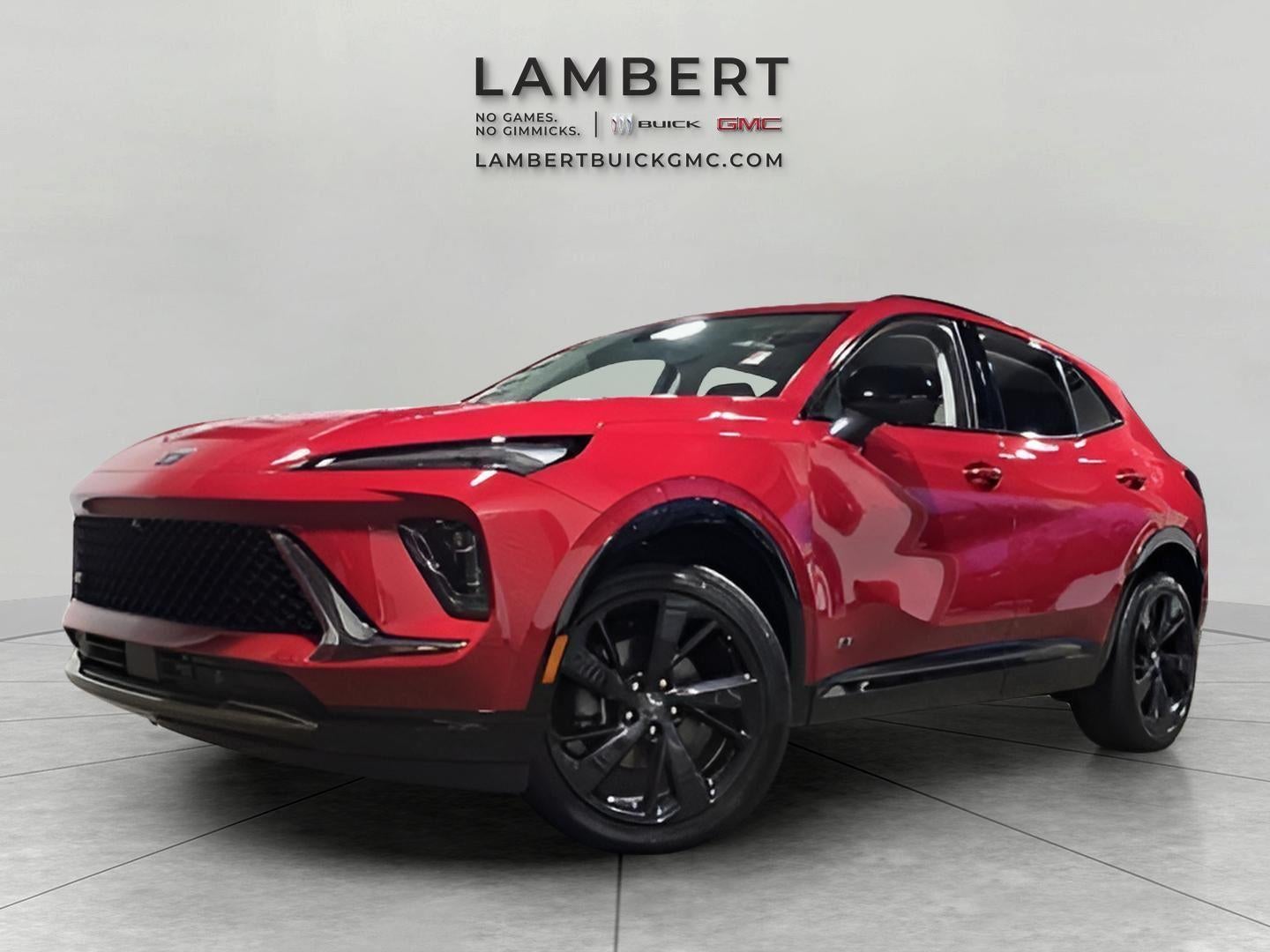 2025 Buick Envision Sport Touring in Brilliant Red — front three-quarter view